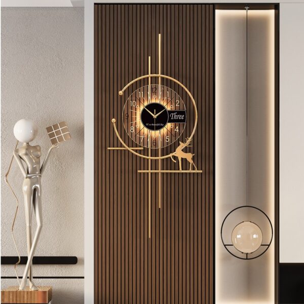 GOLD WALL CLOCK WITH LIGHT-BLACK CIRCLE WITH DEER ON RIGHT