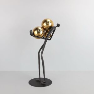 FIGURE HOLDING BALLS DECOR