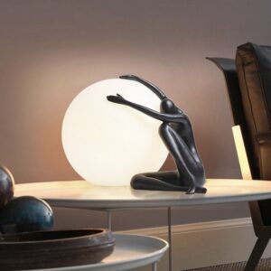 MAN HOLDING LIGHT BALL DECOR