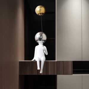 SITTING FIGURE WITH BALLOON